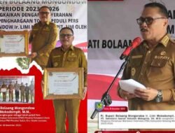 Pj Bupati Bolmong Terima Penghargaan Tokoh Peduli Pers dari PWI Sulut
